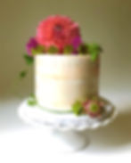 Cutting cake with fresh florals