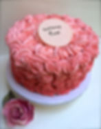Ombre pink rose covered cake