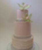 Pink orchids ruffled wedding cake