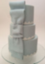 Giant bow 3-tiered wedding cake