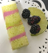 Vanilla cake slice with strawberry buttercream frosting