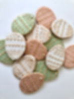 Soft pastel hand painted egg-shaped cookies