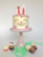 Easter bunny layer cake topped with large ears
