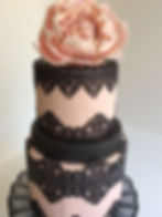 Black lace & pink wedding cake