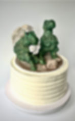 Grooms cake with T-Rex cake topper