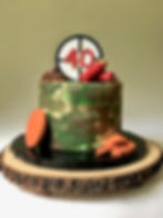 Camouflage cake themed with skeet shooting